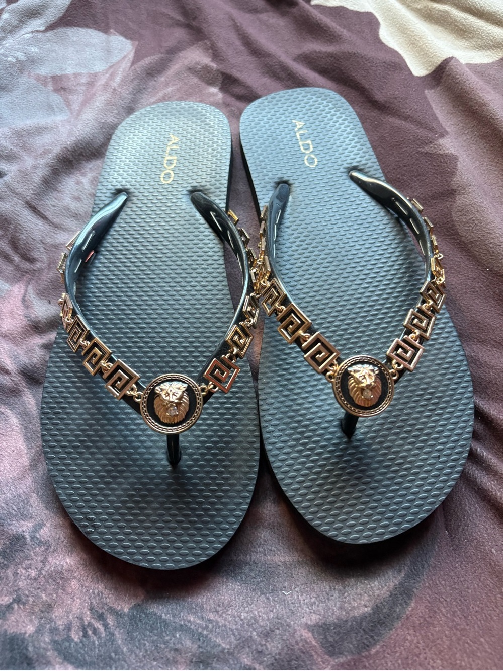 Aldo Black Flip Flops with Gold Medallion Chain Detail